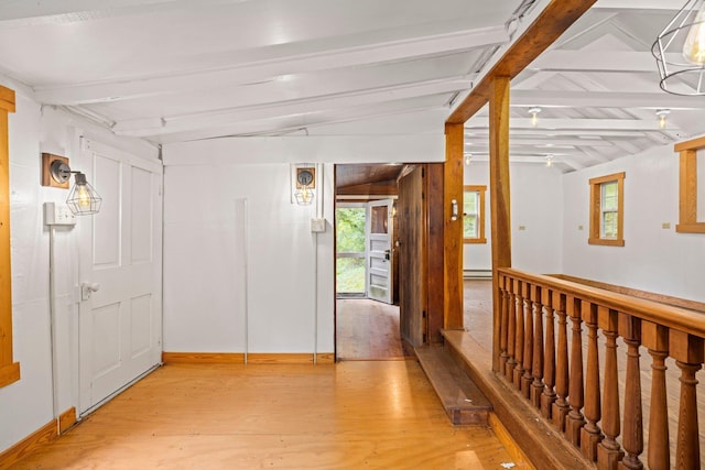 8196 Bow Bender Ln, Singers Glen, VA 22850 - hallway featuring plenty of natural light, light wood-type flooring, and beam ceiling