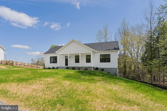 206 Seclusion Shores Dr, Mineral, VA 23117 - modern farmhouse style home with roof with shingles and covered porch