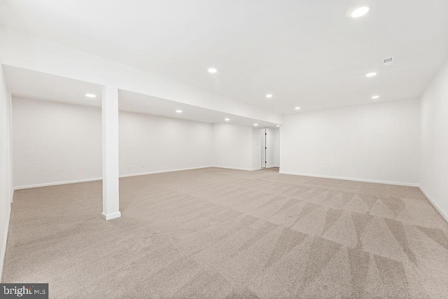 206 Seclusion Shores Dr, Mineral, VA 23117 - finished basement featuring light carpet, recessed lighting, and baseboards