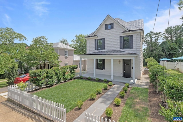 1108 E Jefferson St, Charlottesville, VA 22902 - view of front facade featuring a standing seam roof, a metal roof, and a porch