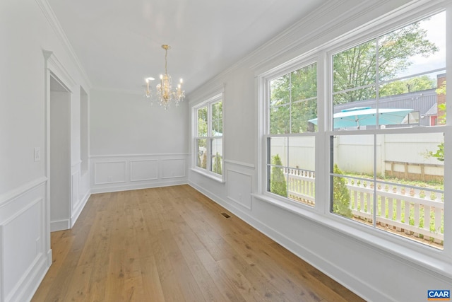 1108 E Jefferson St, Charlottesville, VA 22902 - unfurnished sunroom with a chandelier