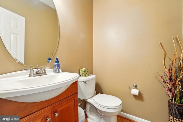 230 Whitworth Dr, Culpeper, VA 22701 - half bath with vanity and wood finished floors