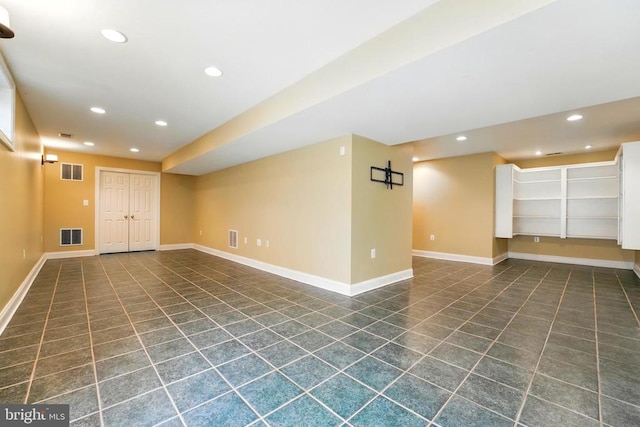 230 Whitworth Dr, Culpeper, VA 22701 - finished below grade area with dark tile patterned flooring and recessed lighting