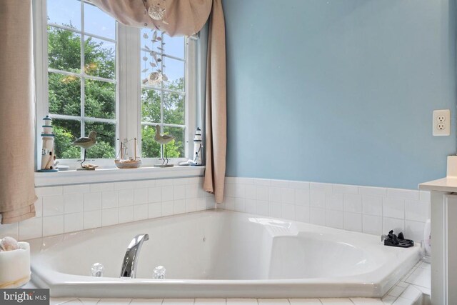  - bathroom with a bath and vanity