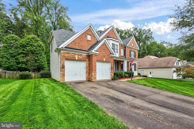 519 Cardinal Ln, Warrenton, VA 20186 - view of front of home with asphalt driveway, stone siding, brick siding, and a garage