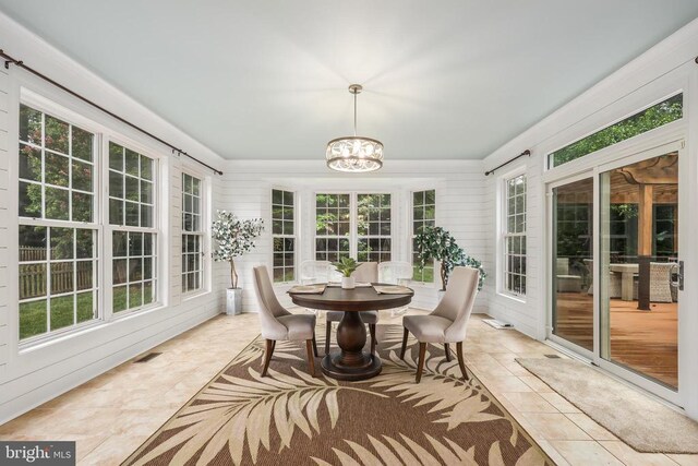 519 Cardinal Ln, Warrenton, VA 20186 - sunroom / solarium with tile patterned floors, a chandelier, and healthy amount of natural light