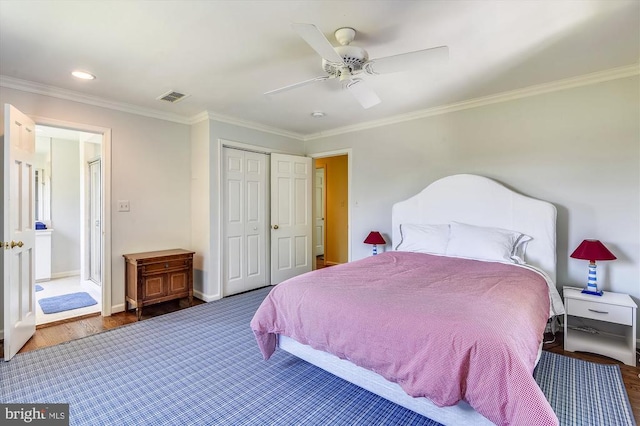  - bedroom with ornamental molding, a closet, wood finished floors, ceiling fan, and baseboards