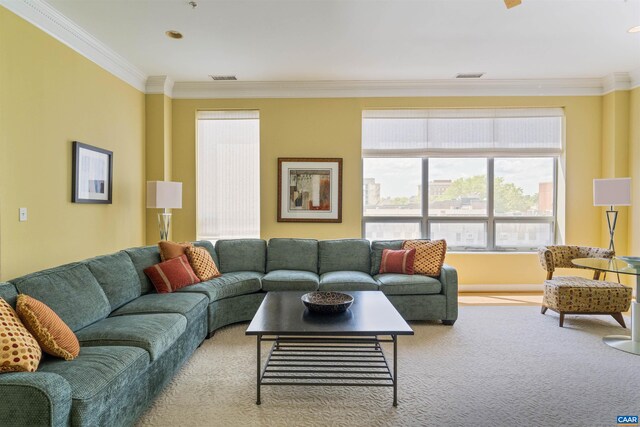 carpeted living area featuring crown molding