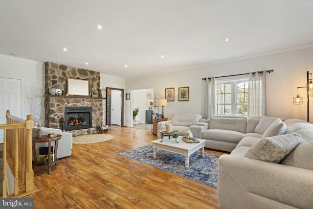 3704 Elk Creek Rd, Mineral, VA 23117 - living area with ornamental molding, a stone fireplace, recessed lighting, and wood finished floors
