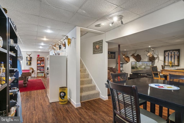 3704 Elk Creek Rd, Mineral, VA 23117 - dining space featuring baseboards, a drop ceiling, stairway, and wood finished floors