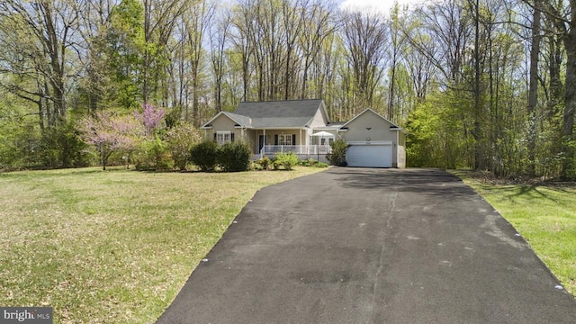 3704 Elk Creek Rd, Mineral, VA 23117 - ranch-style house featuring driveway, covered porch, a garage, and a front yard