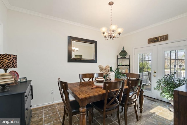 3704 Elk Creek Rd, Mineral, VA 23117 - dining space with ornamental molding, a notable chandelier, stone finish floor, and baseboards