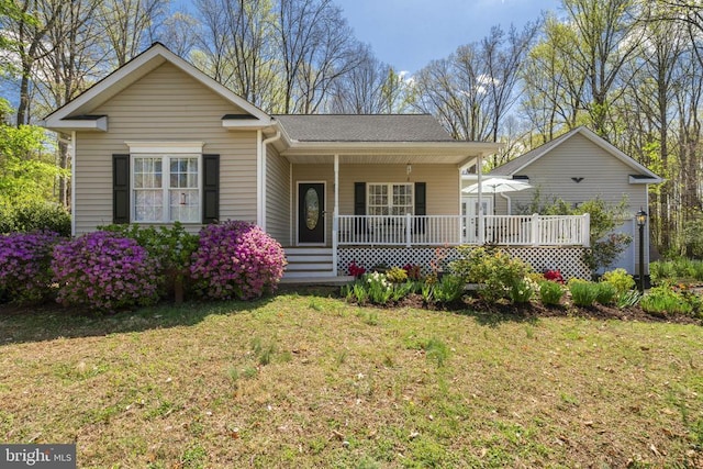 3704 Elk Creek Rd, Mineral, VA 23117 - ranch-style home with a porch and a front yard