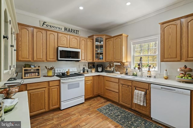 3704 Elk Creek Rd, Mineral, VA 23117 - kitchen with glass insert cabinets, white appliances, a sink, light countertops, and light wood-type flooring