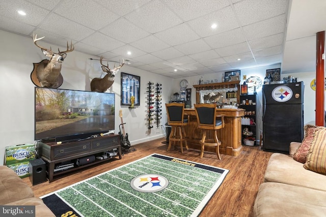 3704 Elk Creek Rd, Mineral, VA 23117 - living room featuring a drop ceiling, a bar, recessed lighting, and wood finished floors