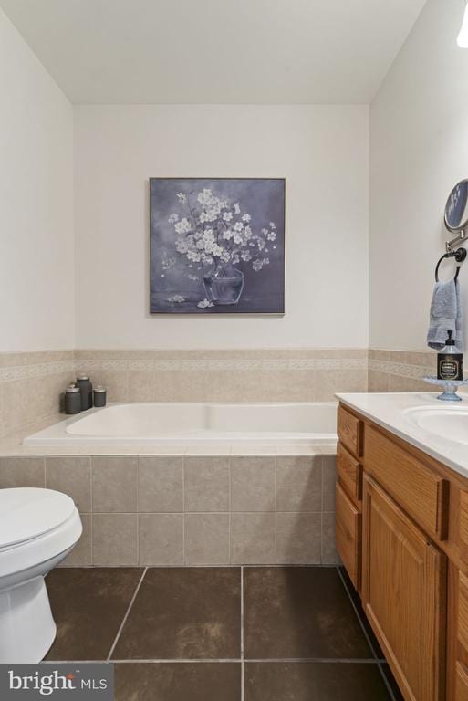 3704 Elk Creek Rd, Mineral, VA 23117 - full bath with tile patterned floors, a bath, toilet, and vanity