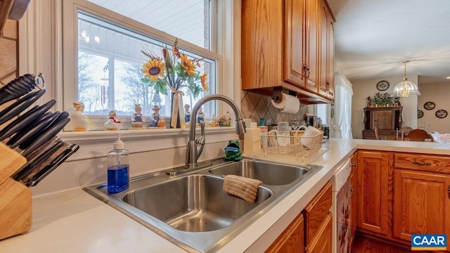 2273 Bloomer Springs Rd, Mcgaheysville, VA 22840 - kitchen featuring a sink, light countertops, and brown cabinets