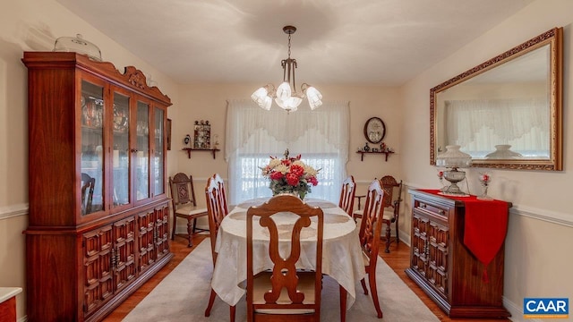 2273 Bloomer Springs Rd, Mcgaheysville, VA 22840 - dining room featuring an inviting chandelier, baseboards, and wood finished floors