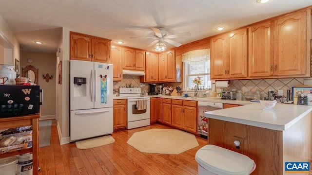 2273 Bloomer Springs Rd, Mcgaheysville, VA 22840 - kitchen featuring under cabinet range hood, decorative backsplash, ceiling fan, and white appliances