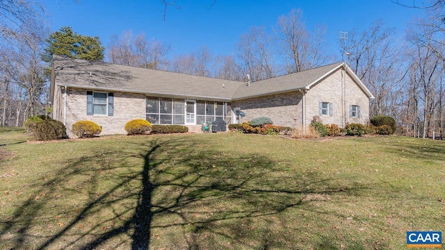 2273 Bloomer Springs Rd, Mcgaheysville, VA 22840 - ranch-style home featuring a sunroom, brick siding, and a front yard
