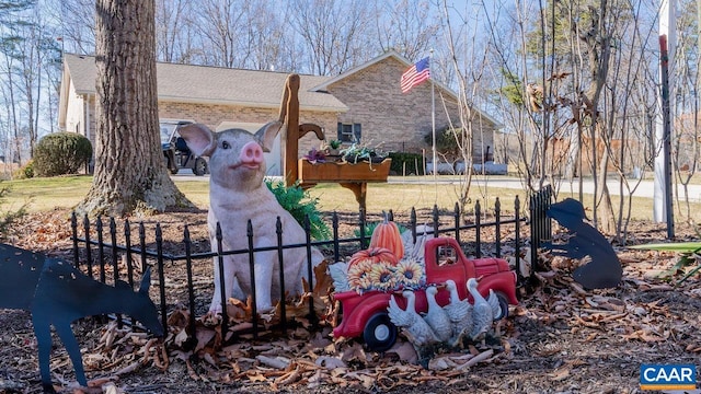 2273 Bloomer Springs Rd, Mcgaheysville, VA 22840 - view of property exterior with fence, a shingled roof, and brick siding