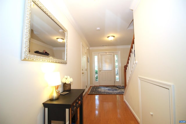 106 Melbourne Prk Cir Unit E, Charlottesville, VA 22901 - doorway featuring wood finished floors, stairway, and crown molding