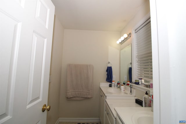 106 Melbourne Prk Cir Unit E, Charlottesville, VA 22901 - bathroom featuring vanity and baseboards