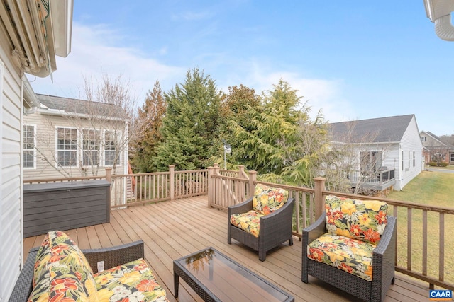 wooden deck featuring an outdoor hangout area