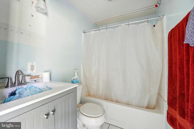  - full bath with toilet, shower / tub combo with curtain, vanity, and tile patterned flooring