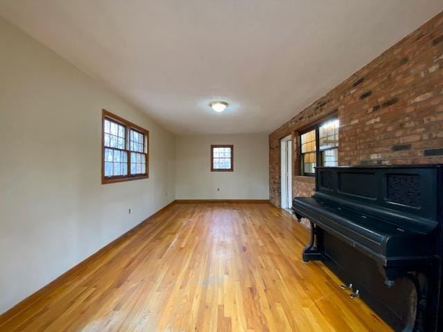 1655 Howardsville Tpke, Stuarts Draft, VA 24477 - unfurnished living room featuring baseboards and light wood-style floors