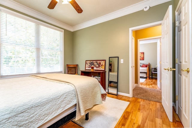 3953 Cavalry Ln, Penn Laird, VA 22846 - bedroom featuring crown molding, light wood-style flooring, baseboards, and ceiling fan