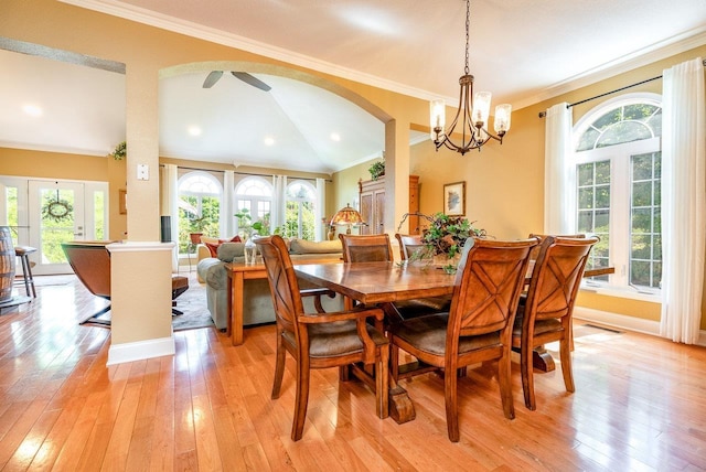 3953 Cavalry Ln, Penn Laird, VA 22846 - dining room with healthy amount of natural light, vaulted ceiling, ornamental molding, and light wood-style floors