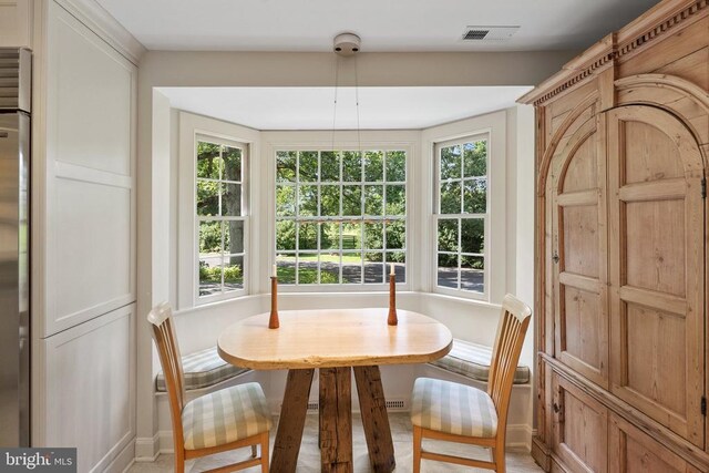 dining space featuring baseboards