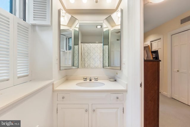 full bathroom featuring vanity