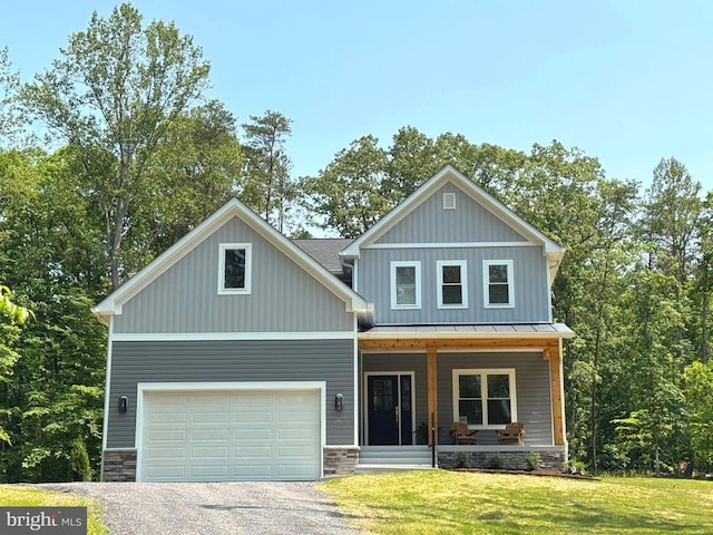 9497 Hollow Oak Ct, Culpeper, VA 22701 - view of front of home featuring covered porch, a standing seam roof, a front yard, an attached garage, and driveway