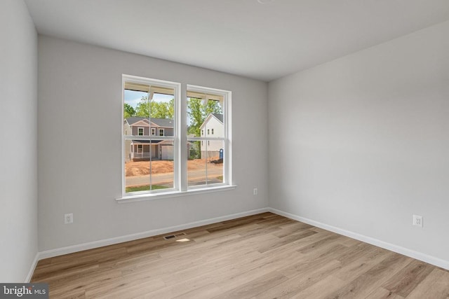 35607 Pine Needle Ln, Locust Grove, VA 22508 - empty room featuring light wood finished floors and baseboards