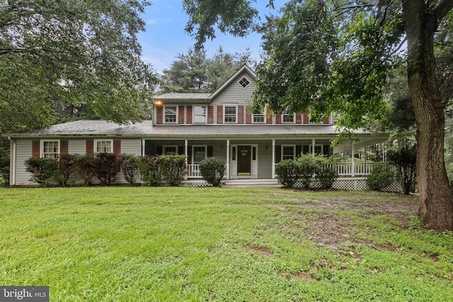  - view of front of home featuring a porch and a front lawn
