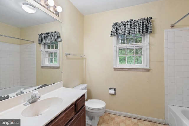 - bathroom with vanity, washtub / shower combination, and tile patterned floors