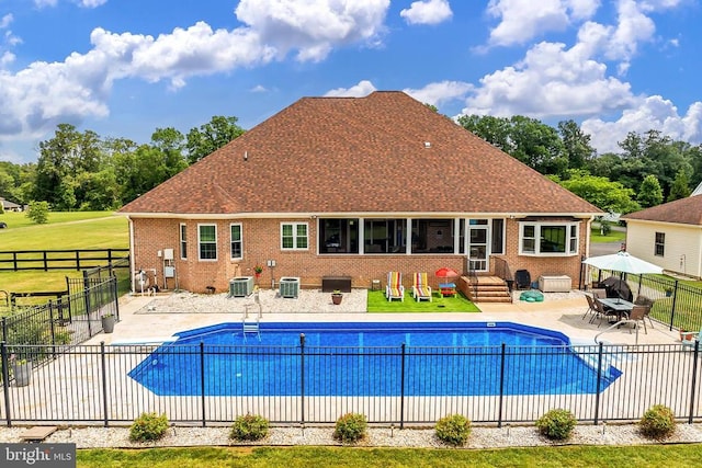  - view of swimming pool with a patio area
