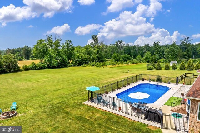  - view of swimming pool with a patio area