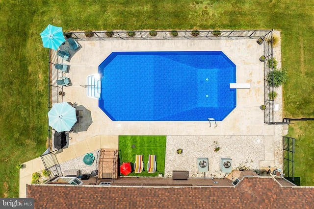  - view of subject property with a pool area