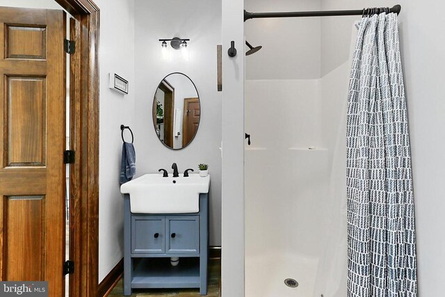  - full bathroom with curtained shower and vanity