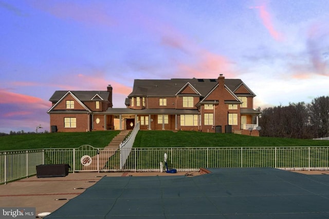 view of front of home featuring a chimney