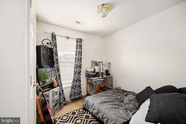 7207 Finch Ln, Fredericksburg, VA 22407 - bedroom featuring light carpet and baseboards