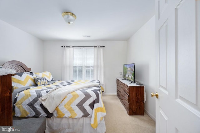 7207 Finch Ln, Fredericksburg, VA 22407 - bedroom featuring light carpet and baseboards