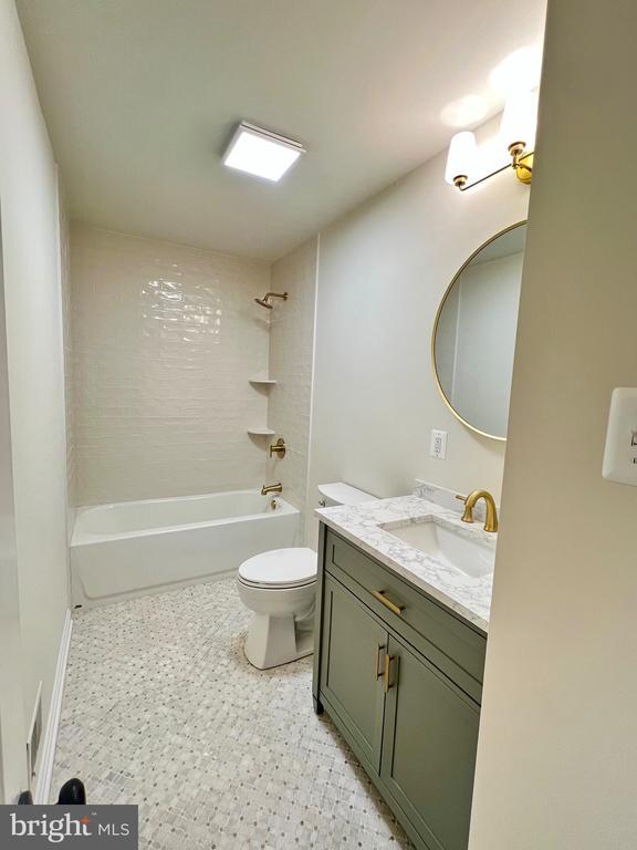 377 Cleveland St, Warrenton, VA 20186 - bathroom featuring vanity and  shower combination