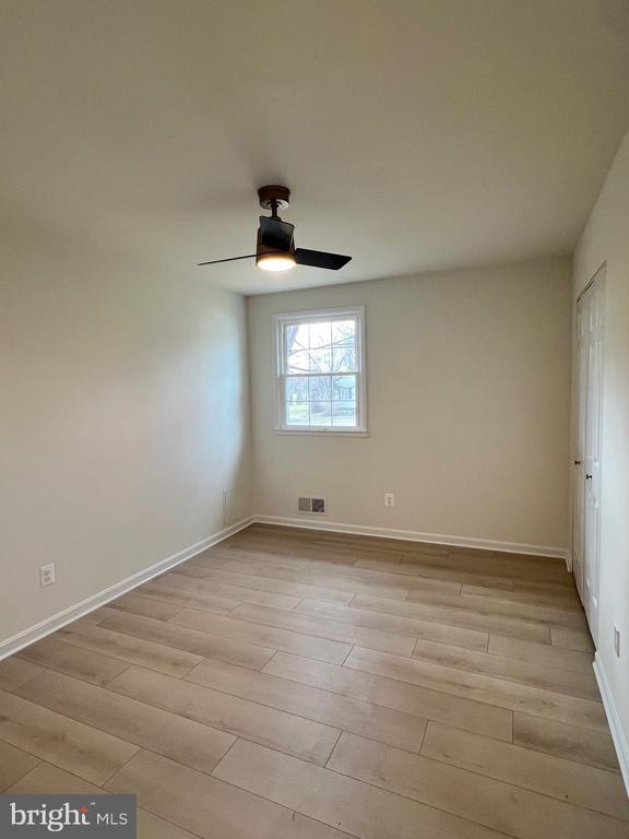 377 Cleveland St, Warrenton, VA 20186 - spare room featuring light wood-type flooring and ceiling fan