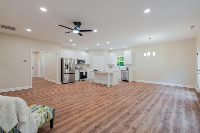 1101 Aspen Ave Unit 1101, Grottoes, VA 24441 - living room with a chandelier, ceiling fan, light wood-style flooring, baseboards, and recessed lighting