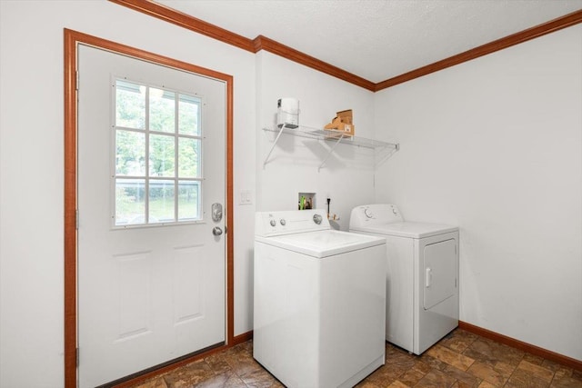 4767 Ox Rd S, Edinburg, VA 22824 - laundry area featuring washing machine and dryer, crown molding, stone finish flooring, and a textured ceiling