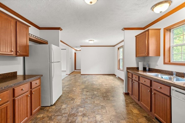 4767 Ox Rd S, Edinburg, VA 22824 - kitchen with white appliances, stone finish floors, crown molding, brown cabinets, and dark countertops